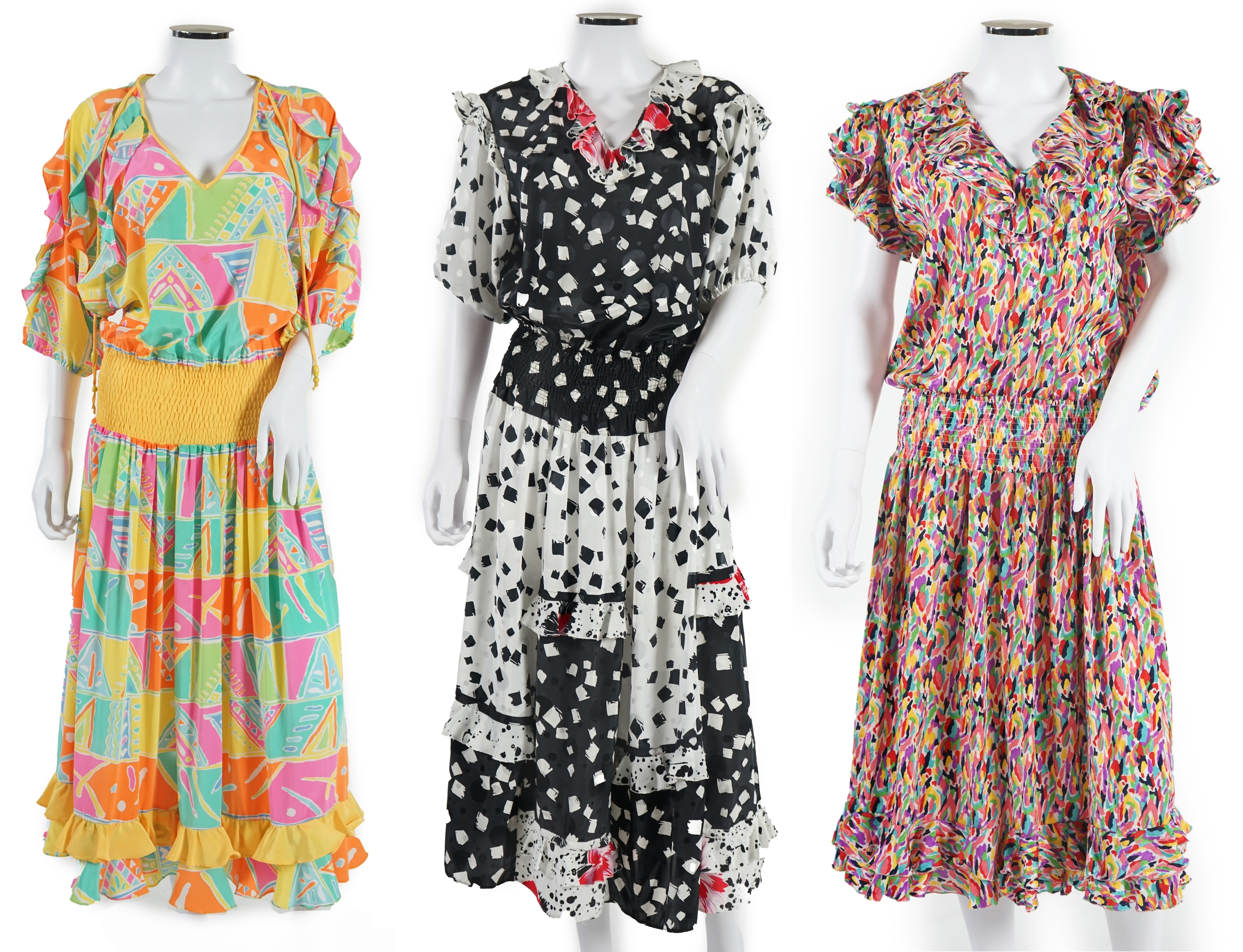 Three multi coloured dresses, no labels. Approx size 10-12 Proceeds to Happy Paws Puppy Rescue